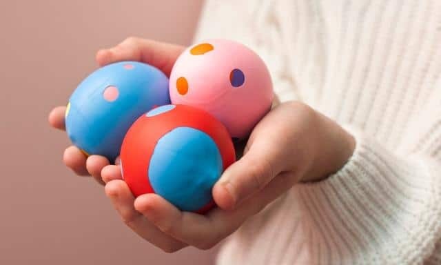 Can juggling a hacky sack help you learn keepy uppies with a football?