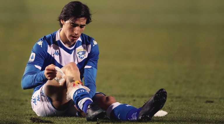 When did football shin guards become mandatory?